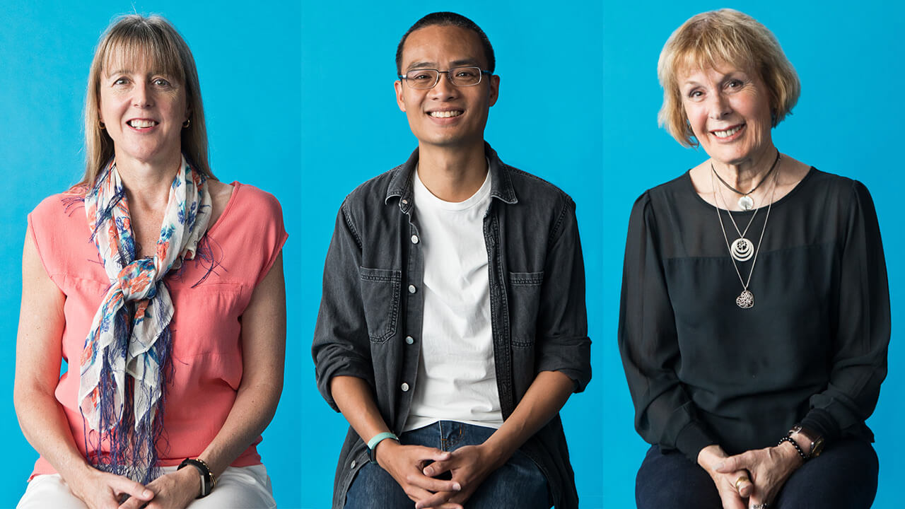 choice members in front of blue screen